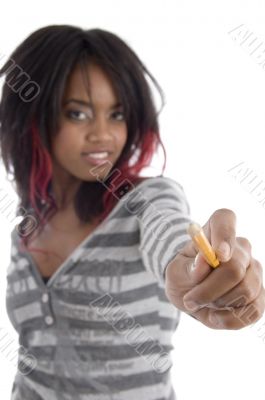 young girl showing pencil