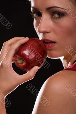 Woman eating an apple