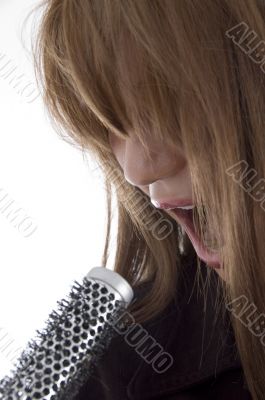 girl singing into karaoke