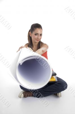 sitting student showing chart