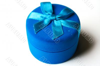 Dark blue box from a velvet with a blue tape