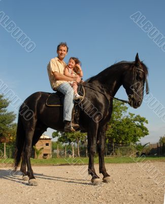 father, daughter, and horse
