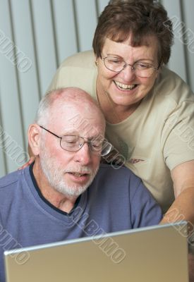 Senior Adults on Laptop Computer