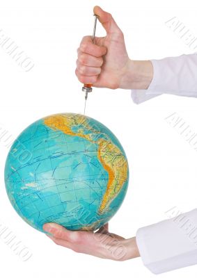 Terrestrial globe and syringe