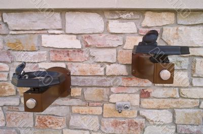 Faucets on a Brick Wall Faucets on a Brick Wall
