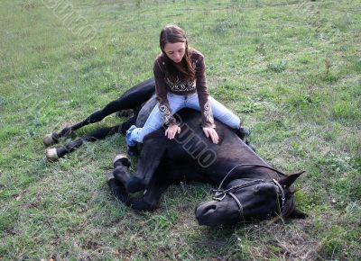 horse laid down and teen