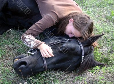 horse laid down and teen