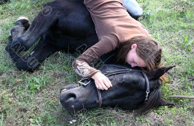 horse laid down and teen