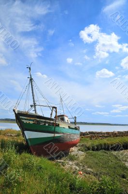 Landcape with damaged boat