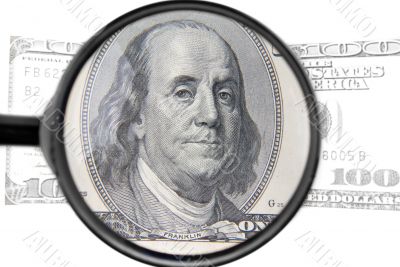 isolated magnifier with dollars