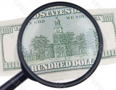 isolated magnifier with dollars