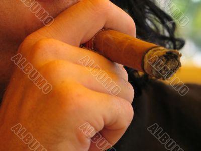 man smoking a cigar