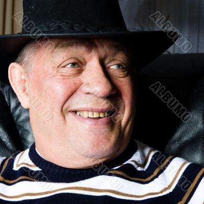 Grandfather who is proud on his new cowboy hat