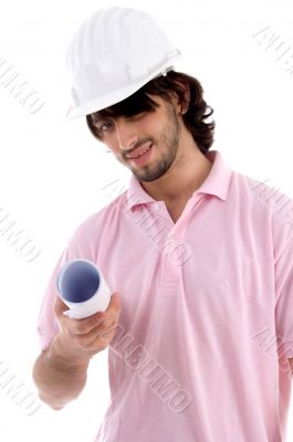 young architect showing blueprint