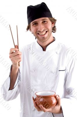 happy chef holding bowl and chopsticks