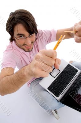 happy man with notebook and pencils