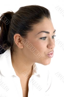 woman making kissing gesture