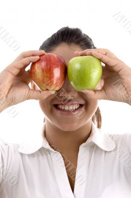 woman posing with apples