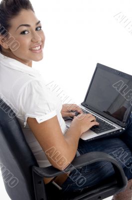 young beautiful female working on laptop