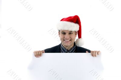 accountant in christmas hat holding placard