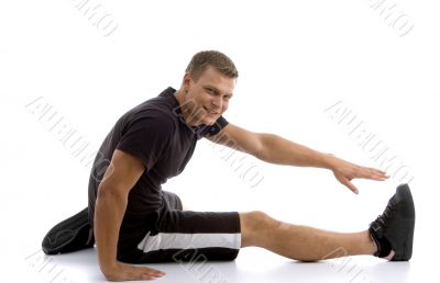 male stretching his leg