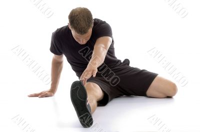 man stretching his legs