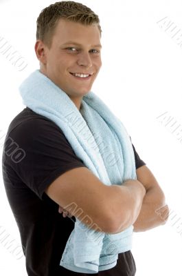 side view of smiling man with towel