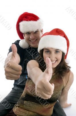 young couple wishing christmas wishes