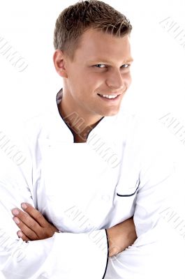young chef posing with his arms crossed