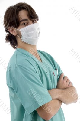 doctor in scrubs and facemask