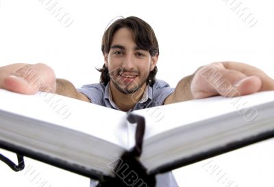 smart guy holding his opened diary