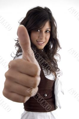 young model with thumbs up hand gesture