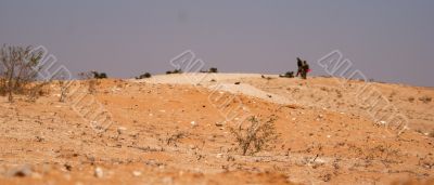 Israeli soldiers excersice in a desert