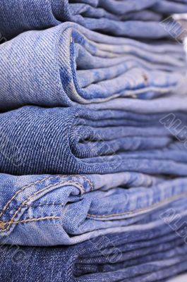 Stack of blue jeans