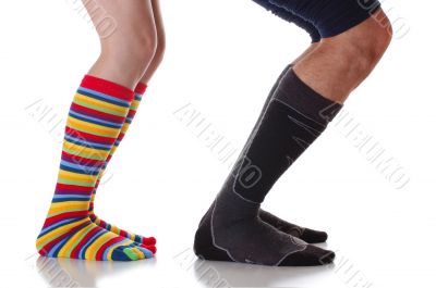 sqatting man and woman