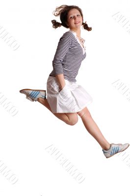 Happy energetic cute girl jumping into the air