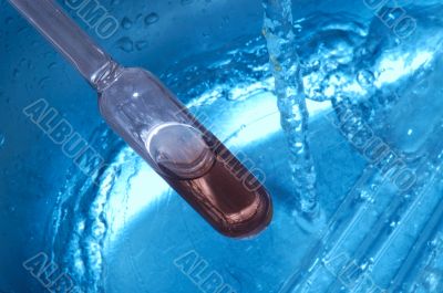 water drops and chemistry glass in laboratory