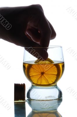 glass filled with some alcohol