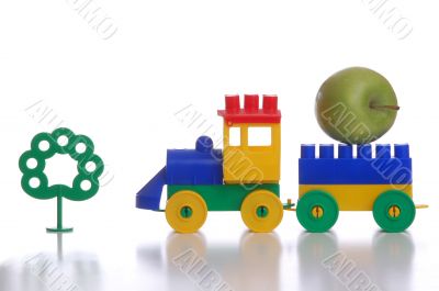 toy plastic train, isolated white background