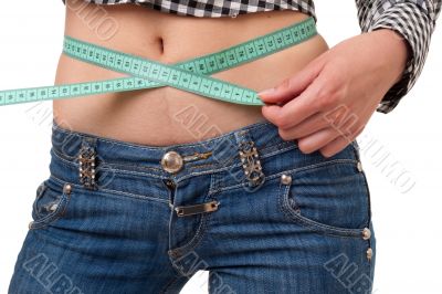 Dieting woman with measuring tape