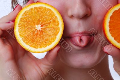 little girl and perfectly fresh orange