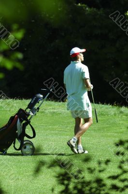Golfer walking