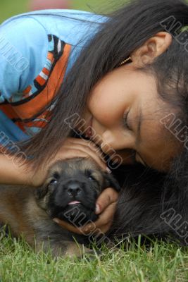 little girl and puppy