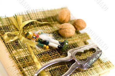 nutcracker, walnuts and decorations