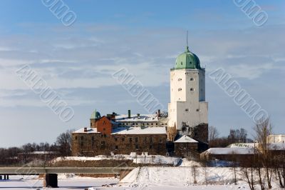 White old tower over winter town