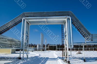 Industrial zone, Steel pipe-lines on blue sky