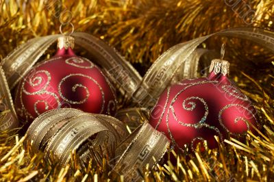 Red christmas ball and gold foil
