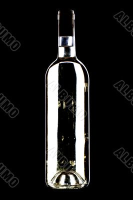 White wine bottle on black