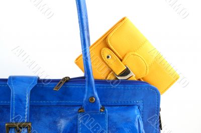 Yellow wallet in a handbag