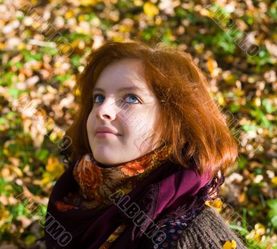 Portrait of the girl in autumn